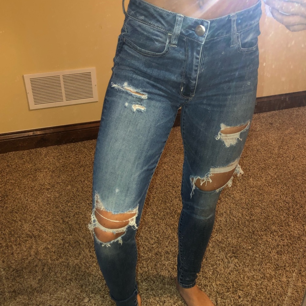 High-Rise Ripped Jeans